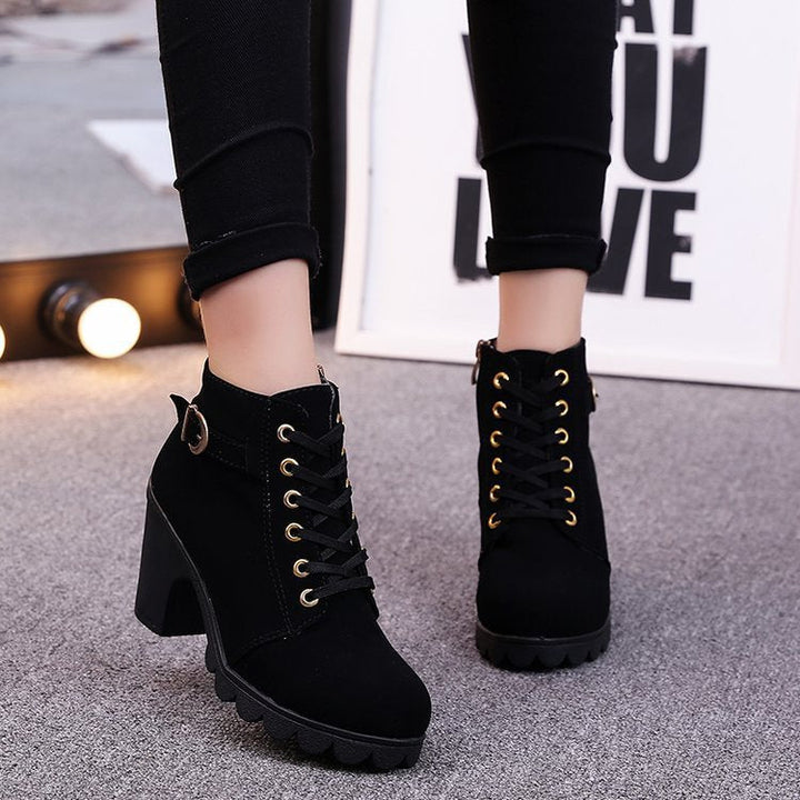 Women's lace-up heeled ankle boots with buckle straps