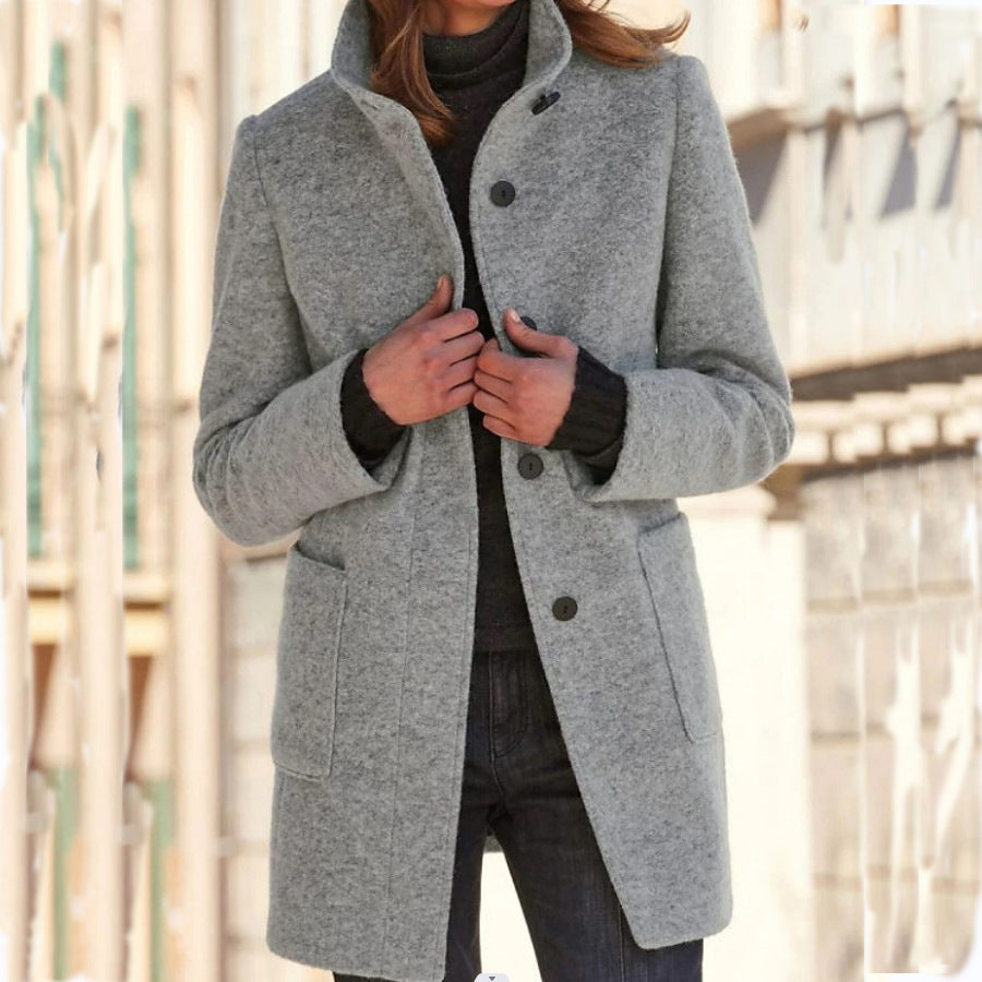 Women's long button-front coat with stand collar and patch pockets
