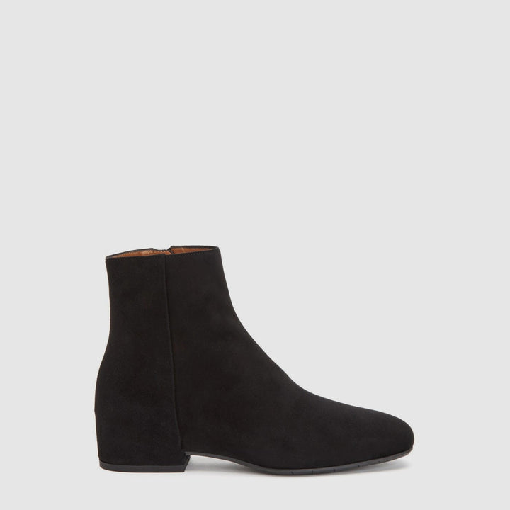 Women's black suede ankle boots with round toes, low heels and side zips