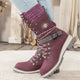 Women's lace-up snow boots with buckle straps and treaded soles