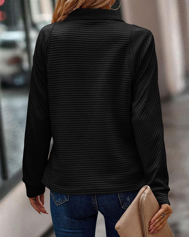 Women's textured quarter-zip sweatshirt with a high mock neck and long sleeves
