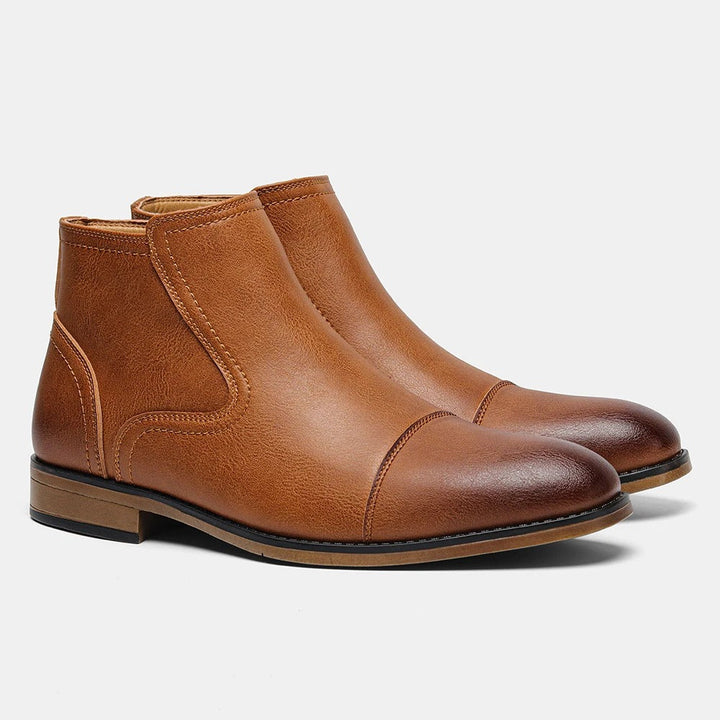 Men's Chelsea ankle boots with elastic side panels, rounded toes and low heels