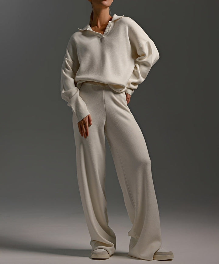 Women's collared sweater and wide-leg trousers set shown in neutral and black colourways