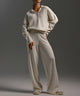 Women's collared sweater and wide-leg trousers set shown in neutral and black colourways