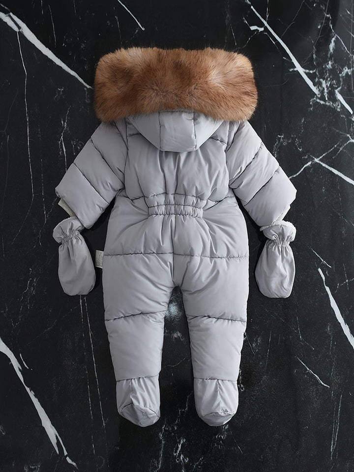 Quilted hooded baby snowsuit with fur trim, enclosed feet and matching mittens