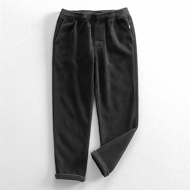 Men's ribbed corduroy pants with tapered legs and cuffed hems