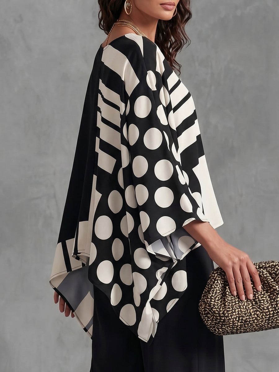 Women's oversized batwing sleeve top with polka-dot print in black and white, and green and white versions