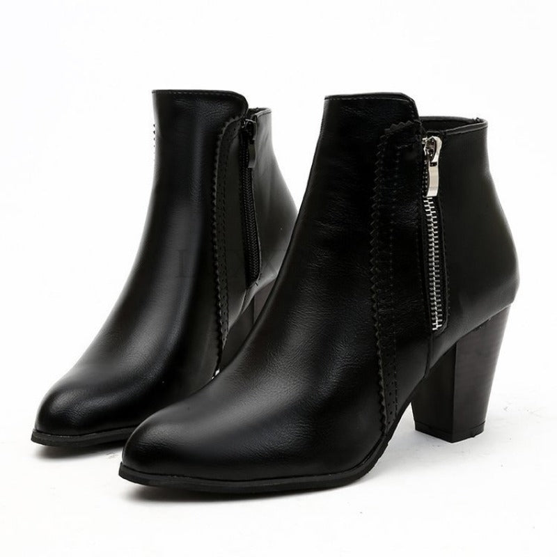 Women's heeled ankle boots with side zipper and almond toe