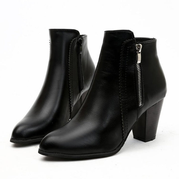 Women's heeled ankle boots with side zipper and almond toe