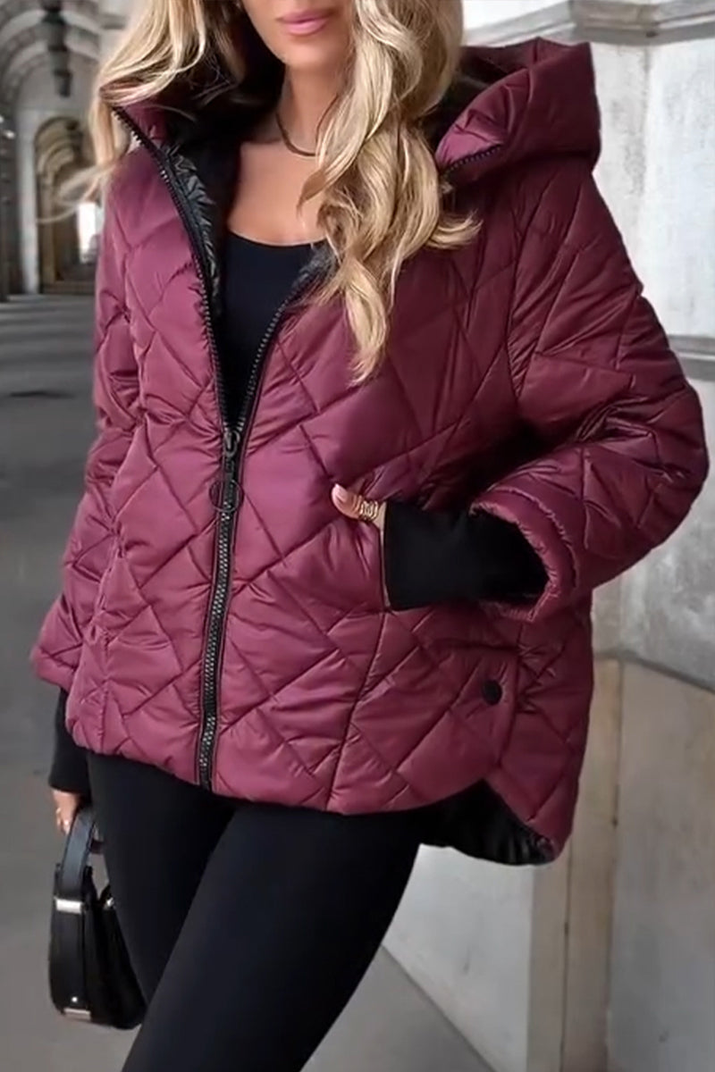 Women's quilted hooded jacket with long sleeves and zip front
