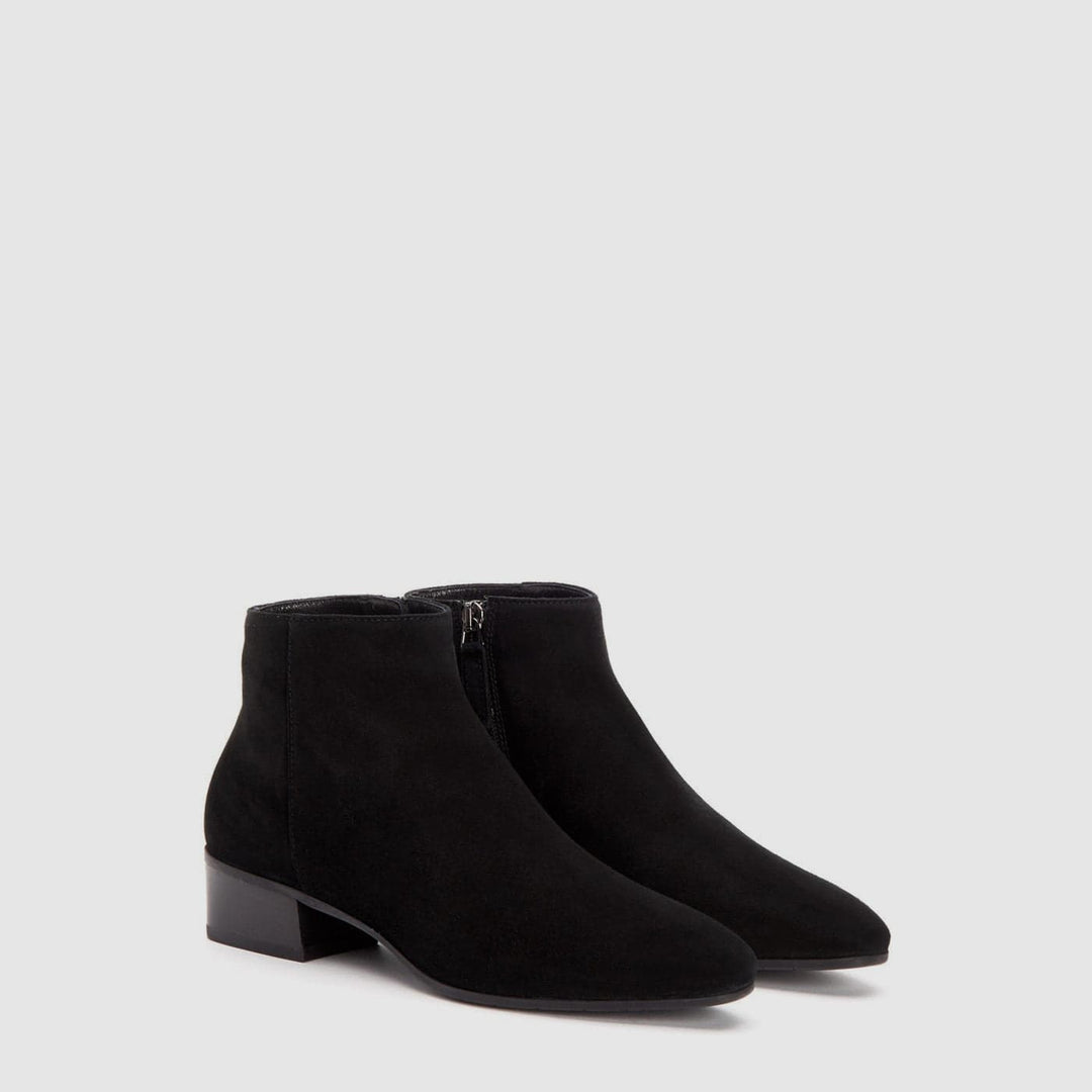 Women's black ankle boot with almond toe and low block heel
