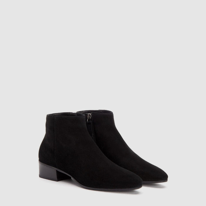 Women's black ankle boot with almond toe and low block heel