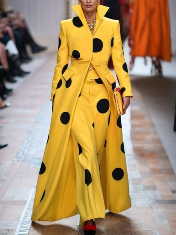 Yellow long coat with large black polka dots