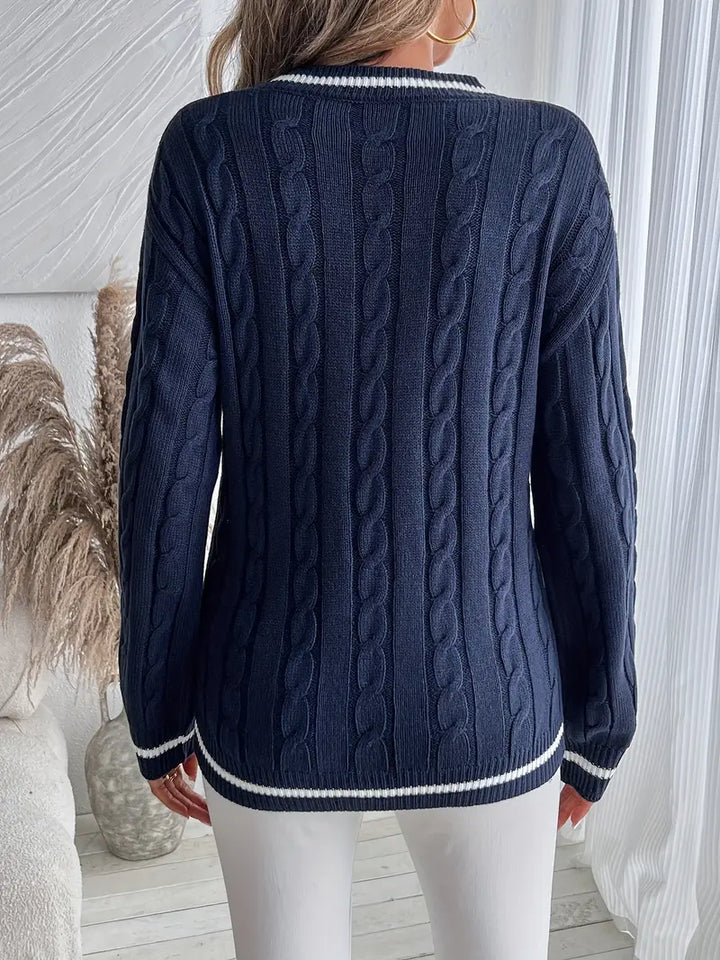 Women's navy cable knit V-neck jumper with white striped trims