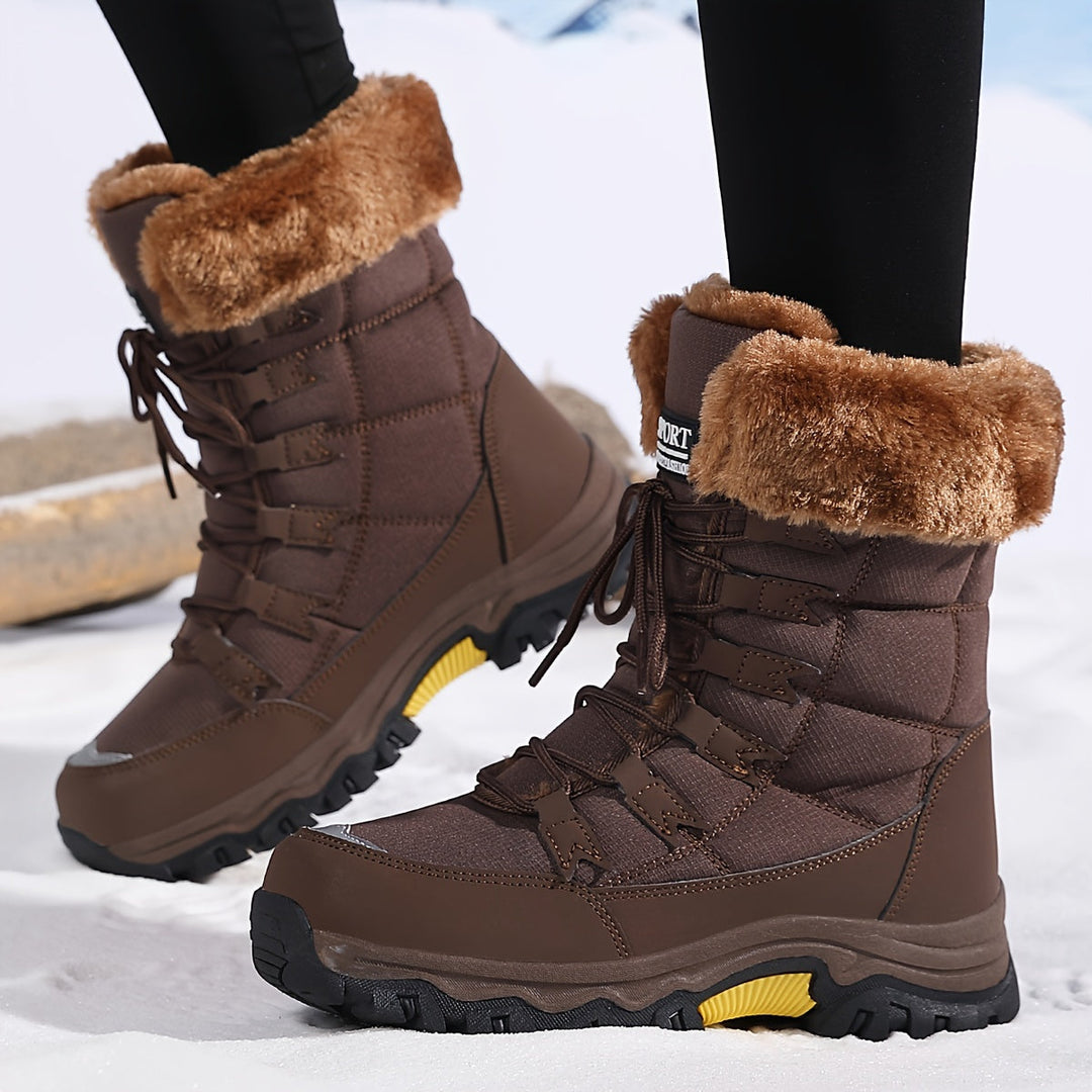 Women's lace-up winter boots with faux-fur cuffs and lug soles