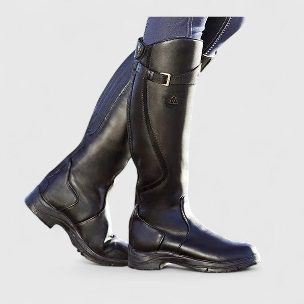 Women's cushioned orthopedic boots with adjustable buckle strap, suede-like upper, and grooved sole.