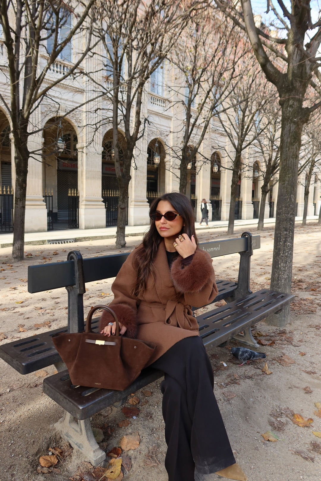 Women's brown long coat with tie belt and fur cuffs