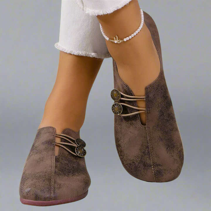 Moccasin loafers with rounded toes, lace detail and flat soles