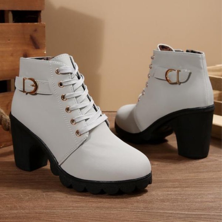 Women's black lace-up ankle boots with metal buckle strap and chunky block heel on platform sole