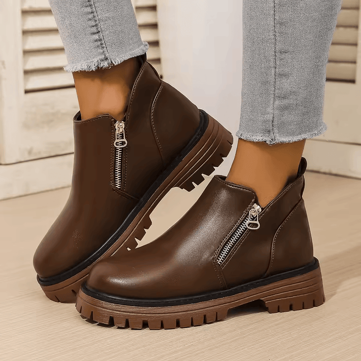 Women's platform ankle boots with side zippers and chunky lug soles