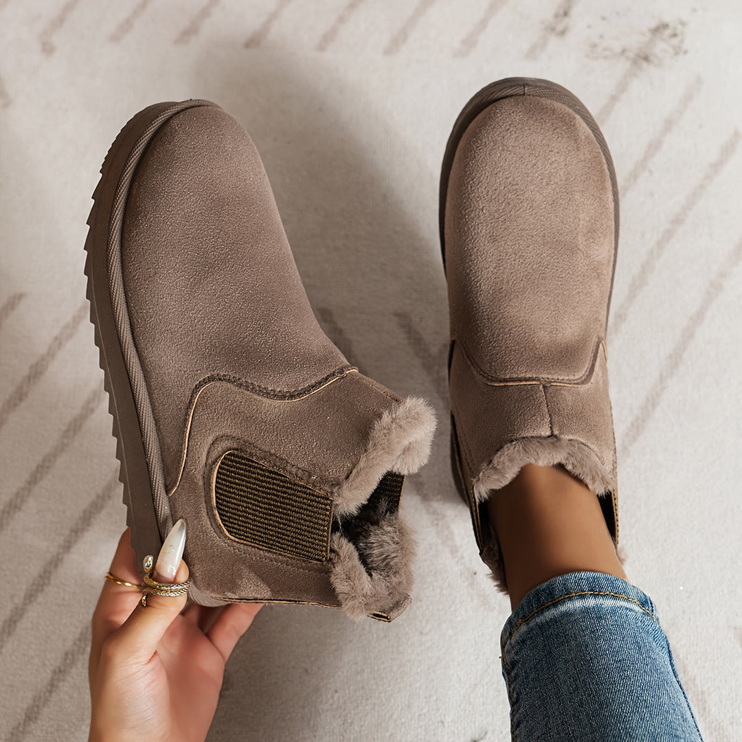 Women's winter ankle boots with faux fur lining and elastic side panels