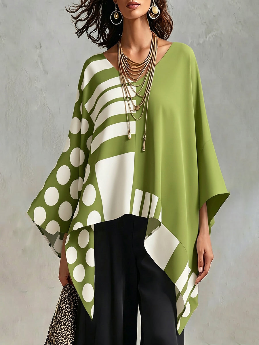 Women's oversized batwing sleeve top with polka-dot print in black and white, and green and white versions