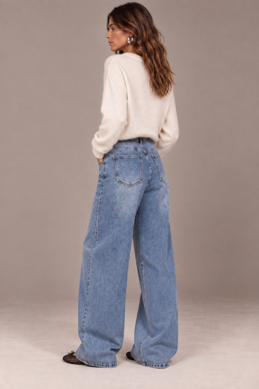 Women's light blue high-rise wide leg jeans with textured finish