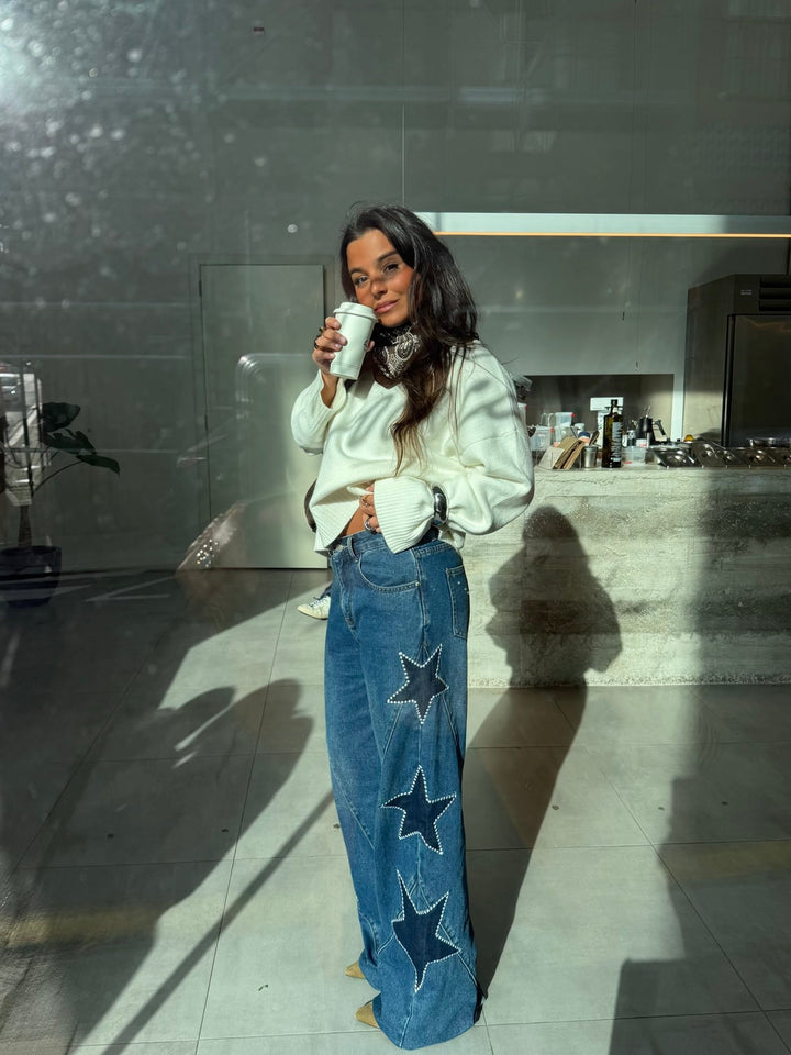 Women's blue wide leg jeans with star details