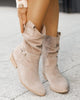 Women's ankle boots with wrap straps and low heels
