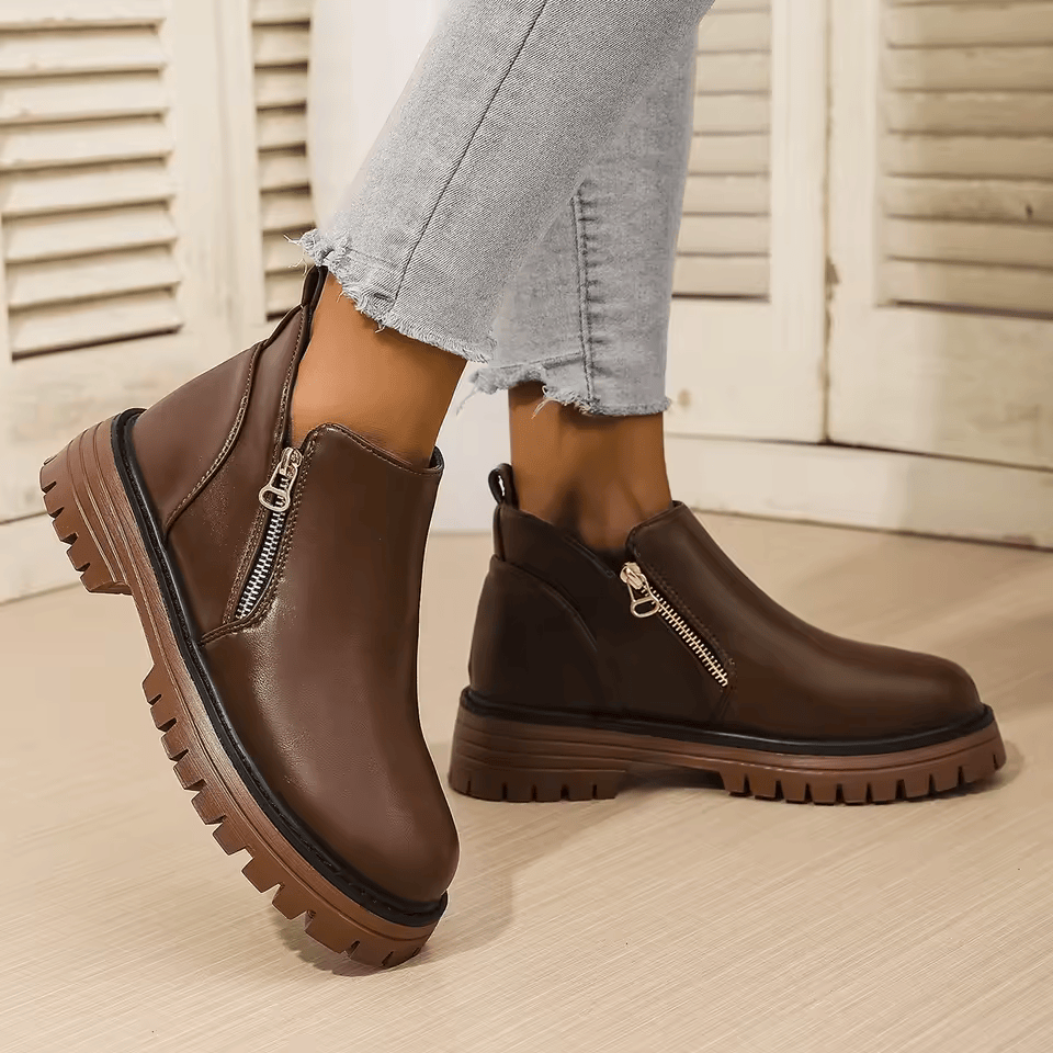 Women's platform ankle boots with side zippers and chunky lug soles