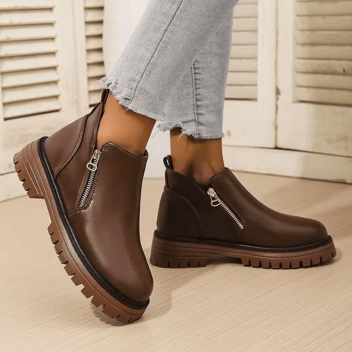 Women's platform ankle boots with side zippers and chunky lug soles