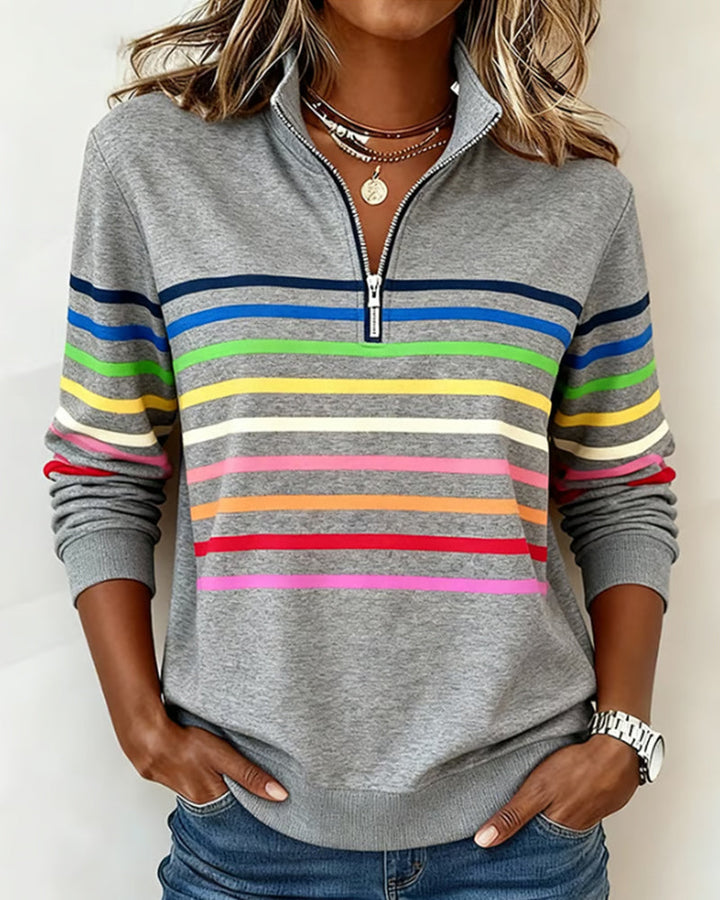 Women's striped half-zip sweatshirt with long sleeves and ribbed trims