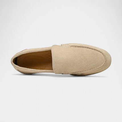 Slip-on loafers with almond-shaped toe, stitched vamp detail and flat sole