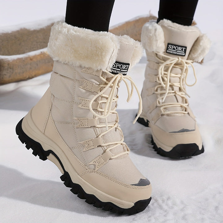 Women's lace-up winter boots with faux-fur cuffs and lug soles