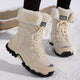 Women's lace-up winter boots with faux-fur cuffs and lug soles