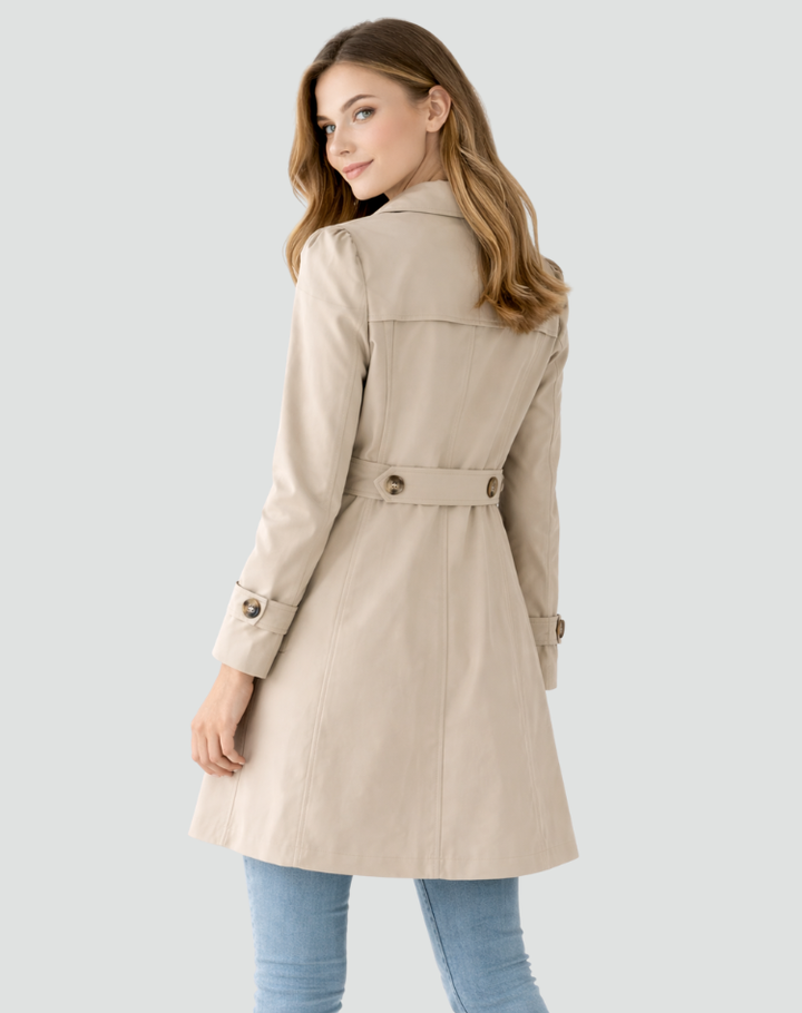 Women's knee-length trench coat with notched lapels, long sleeves and button front
