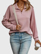 Women's ribbed quarter-zip sweater with mock collar and long sleeves