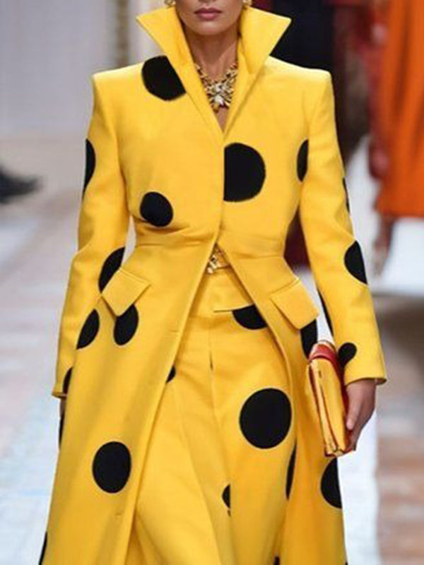 Yellow long coat with large black polka dots