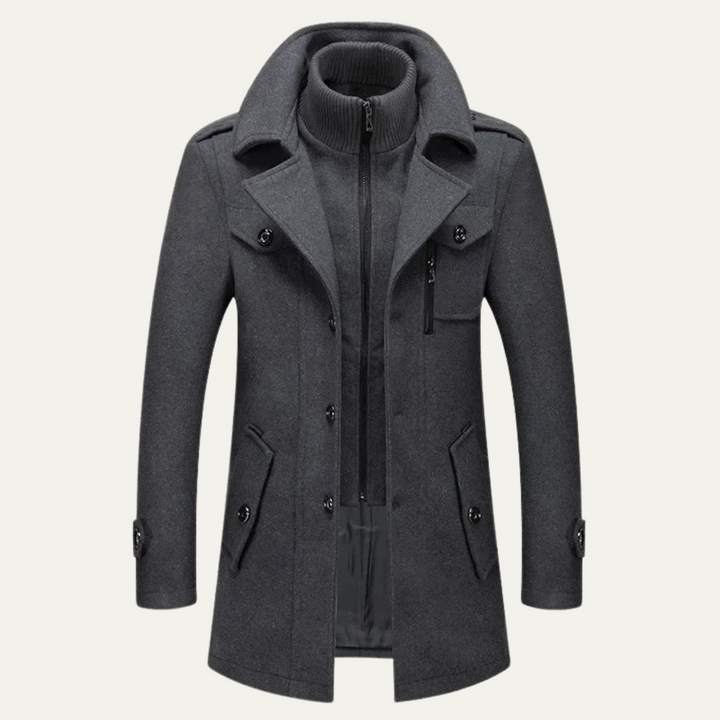 Men's long structured coat with high collar, zip front, buttons and multiple pockets