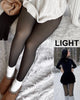 Women's translucent full-length tights styled with a white jumper