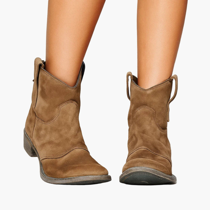 Women's western boots with pull tabs and stitched panels