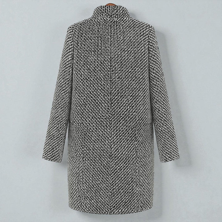 Women's black and white checked long coat with standing collar and button fastening