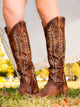 Women's knee-high cowboy boots with pointed toes and embroidered Western shaft detailing