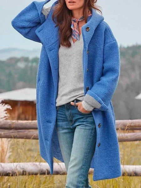 Women's long hooded coat with button front and side pockets