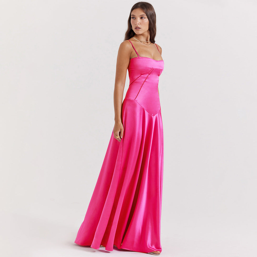 Women's black maxi dress with cowl neckline and cami straps, showing full-length floor skirt and back tie detail