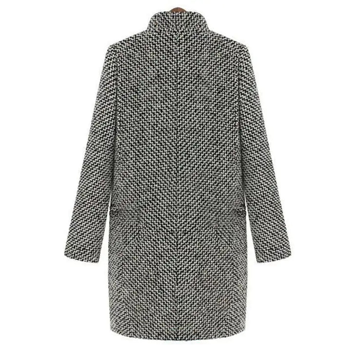 Women's black and white houndstooth long coat with notched lapels and button fastening