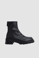 Black ankle boots with chunky block heels and lug soles