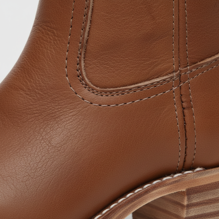 Women's knee-high boots with panelled shafts, rounded toes and block heels