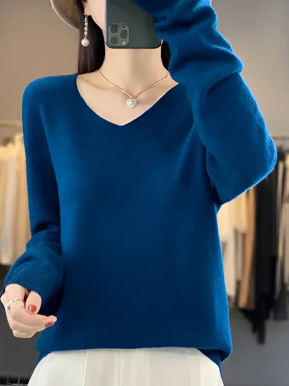 Women's long-sleeve crew neck knit sweater with ribbed cuffs and hem