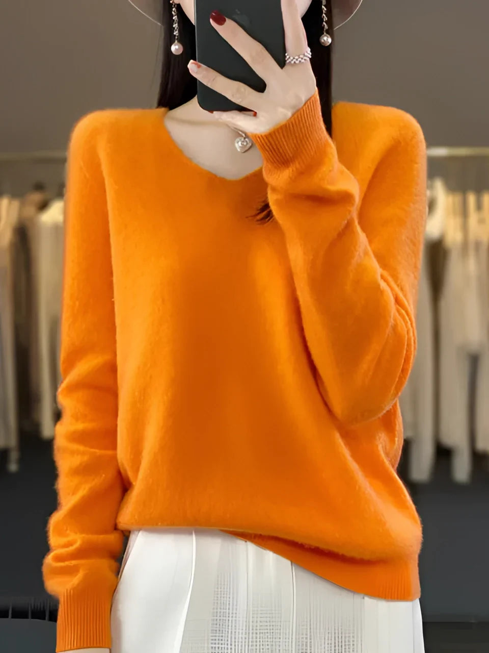 Women's long-sleeve crew neck knit sweater with ribbed cuffs and hem